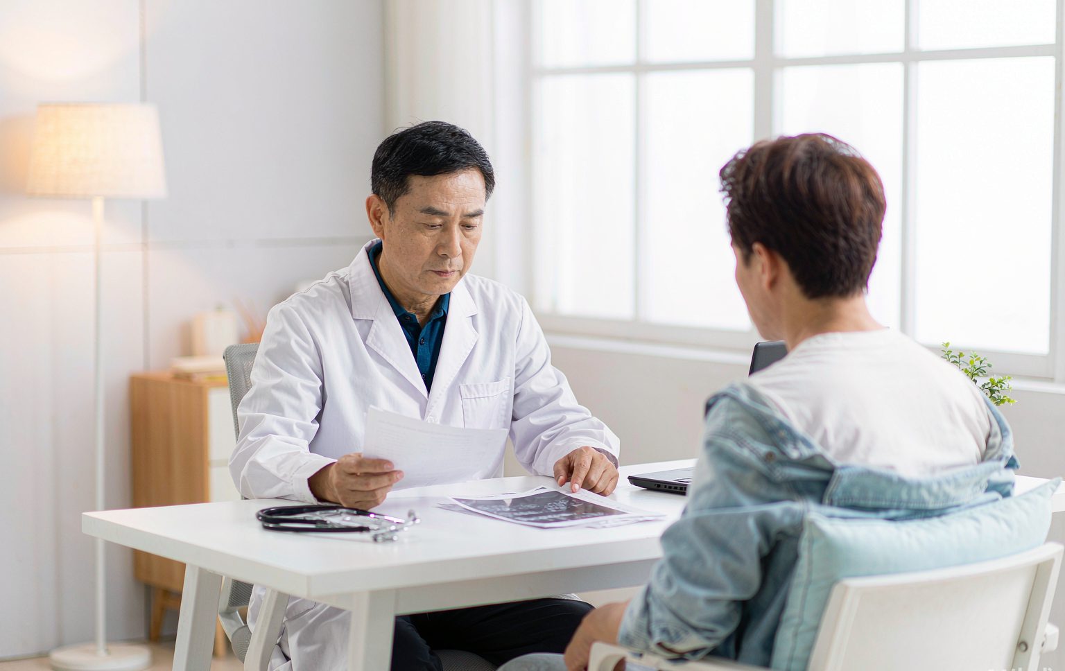Chinese physician during a health check-up